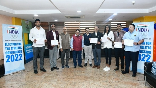 L to R: Om Prakash Karhana, Bajrang Lal, additional returning officer Tapas Bhattacharya, returning officer Umesh Sinha, Shlok Chandra, advocate IOA, Shiva Keshavan, PV Sindhu, Sharath Kamal and Gagan Narang at JLN stadium.(IOA)