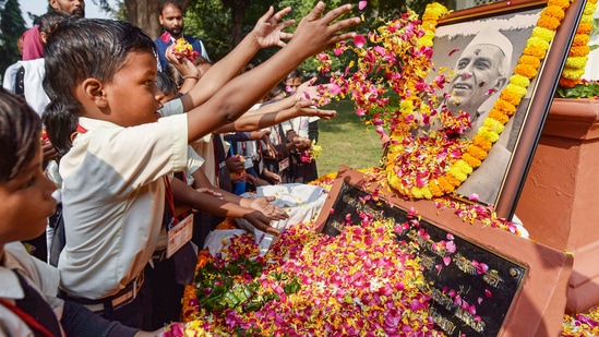 The country is celebrating India's first prime minister Jawaharlal Nehru's 133rd birth anniversary today. He was very fond of children and was popularly known as 'Chacha Nehru.' This is the reason every year, Children’s Day is celebrated across India on November 14. From politicians to students, here's how the country paid tribute to Nehru on his birth anniversary. (PTI)