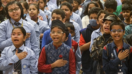Students from a school in Gurugram pay tribute to India's first prime minister Jawaharlal Nehru on his birth anniversary.(PTI)
