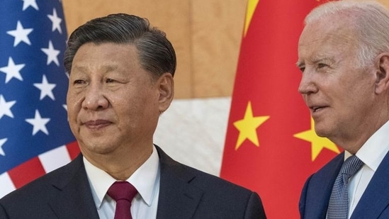 US President Joe Biden (right) with Chinese President Xi Jinping before a meeting on the sidelines of the G20 summit, in Bali, Indonesia, on Monday. (AP)