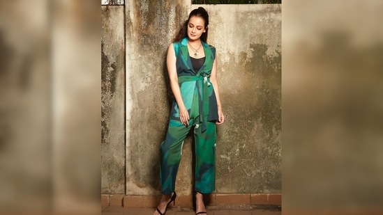 Dia Mirza's outfit includes a jacket, a pair of pants and a belt. The set is crafted in the Jade print carefully printed on pure linen.(Instagram/@diamirzaofficial)