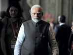 Prime Minister Narendra Modi walks during the G20 Summit in Bali, Indonesia, on Tuesday. (AP) Prime Minister Narendra Modi walks during the G20 Summit in Bali, Indonesia, on Tuesday. (AP)