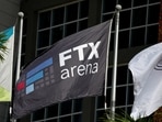The logo of FTX is seen on a flag at the entrance of the FTX Arena in Miami, Florida.