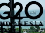 G20 Summit: A ship passes a sign during the G20 leaders' summit in Nusa Dua.(AFP) G20 Summit: A ship passes a sign during the G20 leaders' summit in Nusa Dua.(AFP)