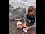 The image, taken from the Instagram video, shows a man baking a break in the ground.