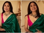 Neena Gupta stuns in a graceful silk saree and sleeveless blouse. Neena Gupta stuns in a graceful silk saree and sleeveless blouse.