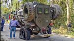 A damaged army vehicle after an encounter with militants in a forest in Tinsukia district, Assam on Monday. (PTI Photo) A damaged army vehicle after an encounter with militants in a forest in Tinsukia district, Assam on Monday. (PTI Photo)