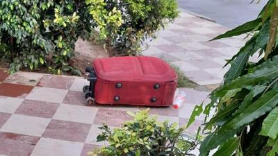 The red suitcase in which the man’s body was found outside Jalandhar City railway station on Tuesday. (HT Phone)