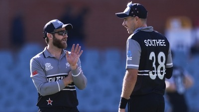 New Zealand captain Kane Williamson, left, talks to bowler Tim Southee (AP)
