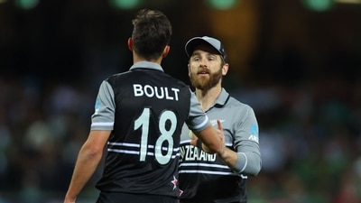 New Zealand's Captain Kane Williamson (R) speaks with New Zealand's Trent Boult during the ICC men's Twenty20 World Cup semis New Zealand's Captain Kane Williamson (R) speaks with New Zealand's Trent Boult during the ICC men's Twenty20 World Cup semis