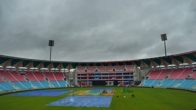 Groundsmen cover the field at the Ekana AB Vajpayee Cricket Stadium | Image for representation (PTI) Groundsmen cover the field at the Ekana AB Vajpayee Cricket Stadium | Image for representation (PTI)
