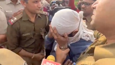 Aaftab Amin Poonawala, accused of killing his live-in partner Shraddha Walkar, being brought to the Mehrauli forest area, in New Delhi, on Tuesday, (PTI) Aaftab Amin Poonawala, accused of killing his live-in partner Shraddha Walkar, being brought to the Mehrauli forest area, in New Delhi, on Tuesday, (PTI)