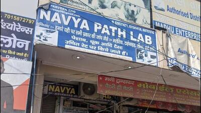 The police conducted the raid after a tip-off. Police said the lab had issued more than 600 reports in the past year . (HT Photo)