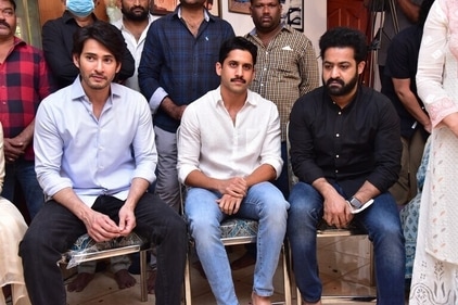 Krishna's son, actor Mahesh Babu (left) with Naga Chaitanya and Jr NTR. Krishna's son, actor Mahesh Babu (left) with Naga Chaitanya and Jr NTR.