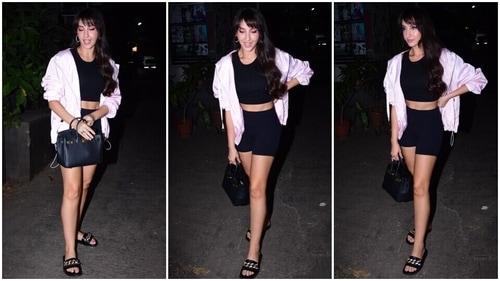 Nora Fatehi styles the all-black ensemble with minimal accessories. (HT Photo/Varinder Chawla) Nora Fatehi styles the all-black ensemble with minimal accessories. (HT Photo/Varinder Chawla)