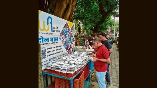 Volunteers distribute food outside government hospitals