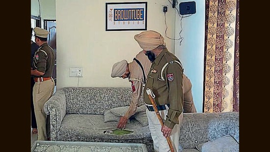 Cops inspecting a PG accommodation in Mohali on Tuesday. (HT File)