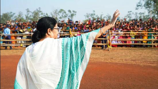 West Bengal chief minister Mamata Banerjee waves to the crowd during a programme in Jhargram on Tuesday. (AITC Twitter)