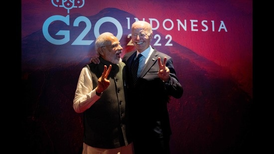 President Joe Biden (R) gestures with Prime Minister Narendra Modi. (AFP)