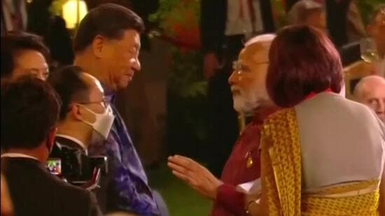 Prime Minister Narendra Modi with Chinese President Xi Jinping at the G20 dinner hosted by Indonesian President Joko Widodo in Bali on Tuesday. (Reuters Photo)