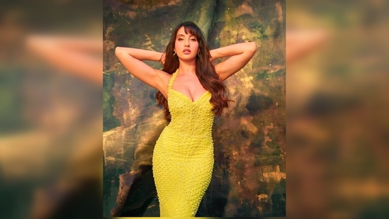Nora Fatehi pairs sexy neon yellow bodycon dress with ₹3 lakh bag for shoot