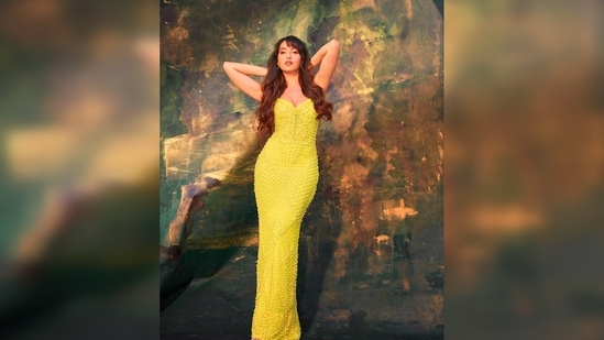 Nora Fatehi pairs sexy neon yellow bodycon dress with ₹3 lakh bag for shoot