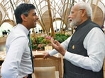 Prime Minister Narendra Modi interacts with his UK counterpart Rishi Sunak in Bali on Tuesday. (ANI Photo)