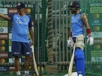 Indian cricket head coach Rahul Dravid stands with Virat Kohli during a training session Indian cricket head coach Rahul Dravid stands with Virat Kohli during a training session