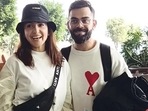 Anushka Sharma and Virat Kohli twin in black and white outfits at the airport. (HT Photo/Varinder Chawla) Anushka Sharma and Virat Kohli twin in black and white outfits at the airport. (HT Photo/Varinder Chawla)
