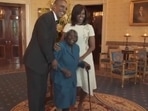 Virginia McLaurin with Barack and Michelle Obama in 2016 at White House event. Virginia McLaurin with Barack and Michelle Obama in 2016 at White House event.