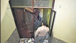 A man on Wednesday takes pictures from the window of the flat where Aaftab Poonawala (inset, above) allegedly murdered Shraddha Walkar in Chhattarpur in New Delhi. (Sanchit Khanna/HT Photo) A man on Wednesday takes pictures from the window of the flat where Aaftab Poonawala (inset, above) allegedly murdered Shraddha Walkar in Chhattarpur in New Delhi. (Sanchit Khanna/HT Photo)