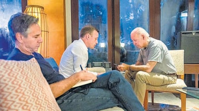 Antony Blinken, Jake Sullivan and President Joe Biden in a late-night huddle. (REUTERS) Antony Blinken, Jake Sullivan and President Joe Biden in a late-night huddle. (REUTERS)