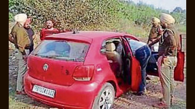 The car in which the woman’s body was found on Wednesday. (HT Photo)