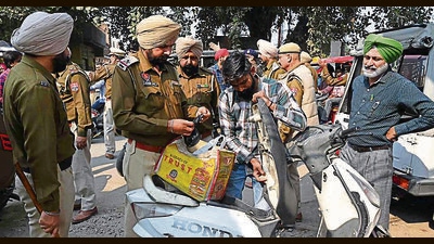 Punjab police check a scooter during a search operation in a drug hotspot area in Amritsar on Tuesday. (AFP file photo) Punjab police check a scooter during a search operation in a drug hotspot area in Amritsar on Tuesday. (AFP file photo)