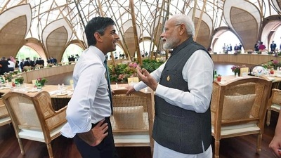 Prime Minister Narendra Modi interacts with his United Kingdom counterpart Rishi Sunak on the first day of the 17th G20 Summit, in Bali on Tuesday. Prime Minister Narendra Modi interacts with his United Kingdom counterpart Rishi Sunak on the first day of the 17th G20 Summit, in Bali on Tuesday.
