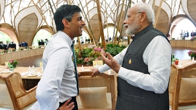 Prime Minister Narendra Modi interacts with his UK counterpart Rishi Sunak in Bali on Tuesday. (ANI Photo) Prime Minister Narendra Modi interacts with his UK counterpart Rishi Sunak in Bali on Tuesday. (ANI Photo)