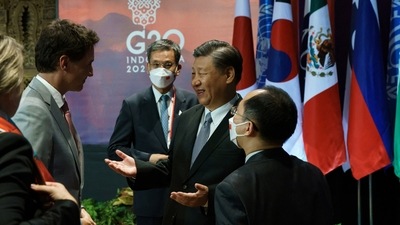 Canada's Prime Minister Justin Trudeau speaks with China's President Xi Jinping at the G20 Leaders' Summit in Bali, Indonesia. (via REUTERS)