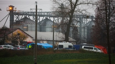 Police officers work at the site after explosions in Przewodow, a village in eastern Poland near the border with Ukraine. (REUTERS)