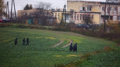 Police officers walk near the site of an explosion in Przewodow, a village in eastern Poland near the border with Ukraine, November 16, 2022. (REUTERS)