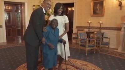 Virginia McLaurin with Barack and Michelle Obama in 2016 at White House event. (The Obama White House)