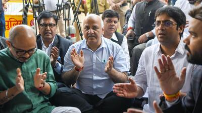 AAP leaders and supporters sitting on dharna outside the Election Commission office in New Delhi on Wednesday over the alleged disappearance of AAP candidate from Gujarat, Kanchan Jariwala. (ANI)