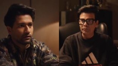 Vicky Kaushal and Karan Johar in the video.