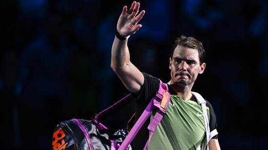 Spain's Rafael Nadal waves as he leaves after losing his round-robin match against Canada's Felix Auger-Aliassime on November 15, 2022 at the ATP Finals tennis tournament in Turin. (Photo by Marco BERTORELLO / AFP)(AFP)