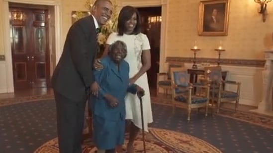 Virginia McLaurin with Barack and Michelle Obama in 2016 at White House event.(The Obama White House)