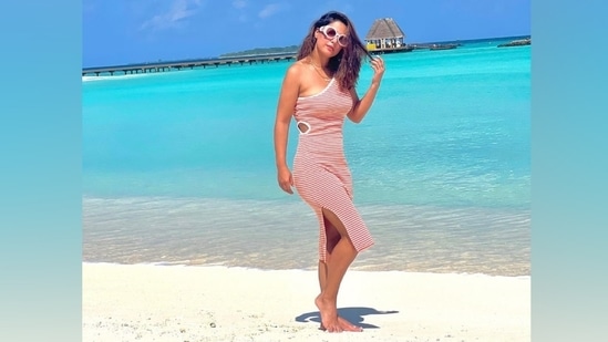 Lastly, Hina left her wavy tresses open in a side parting, and for the glam picks, she chose glossy mauve lip shade, blushed cheeks, glowing skin and darkened brows to complete the beach look.(Instagram)