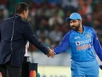 Indian skipper Rohit Sharma shakes hand with Ravi Shastri at the toss Indian skipper Rohit Sharma shakes hand with Ravi Shastri at the toss
