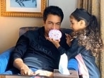 Asin's daughter Arin with her father Rahul Sharma during their makeup session. Asin's daughter Arin with her father Rahul Sharma during their makeup session.