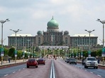 Malaysia Elections Motorists drive on a road in front of the office complex of the Malaysian prime minister in Putrajaya.(AFP) Malaysia Elections Motorists drive on a road in front of the office complex of the Malaysian prime minister in Putrajaya.(AFP)