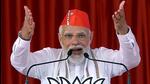 Rajkot, Oct 11 (ANI): Prime Minister Narendra Modi addresses a public rally, at Jamkandorana, in Rajkot Tuesday. (ANI Photo) (ANI) Rajkot, Oct 11 (ANI): Prime Minister Narendra Modi addresses a public rally, at Jamkandorana, in Rajkot Tuesday. (ANI Photo) (ANI)