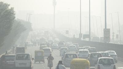 Vehicles ply on the Gurugram-Delhi Expressway on Thursday. (ANI)